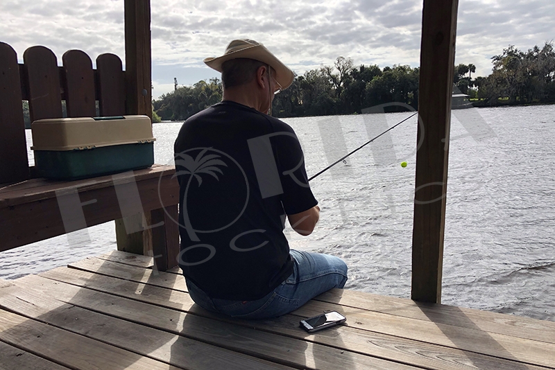 man fishing a river